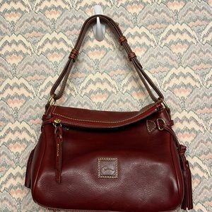 Dooney & Bourke maroon purse. No scratches or signs of wear.